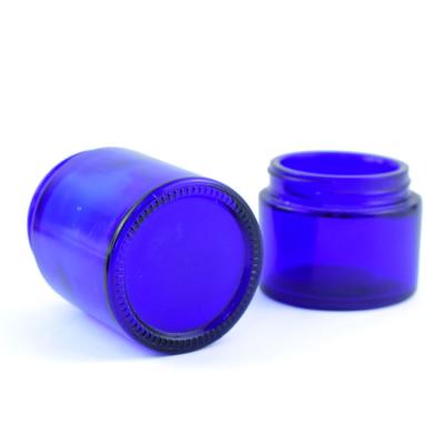 China Cobalt Blue 2oz Child Packaging Resistant Glass Jar With Child Proof Lid For Flower Packaging for sale