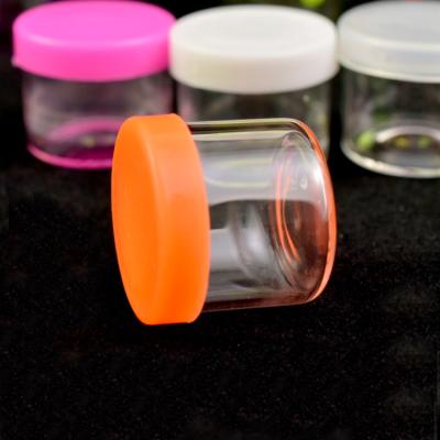 China 5ml 6ml High Borosilicate Glass Cosmetic Jar Extracts Concentrate Packaging Jar With Silicone Flat Cap And Soft Cap for sale