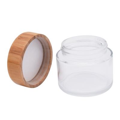 China Personal Care Custom Design Smell Proof 5 30 50 70 110 150 220 Ml Child Proof Glass Flower Jar Airtight Stash Jars With Wooden Cap for sale