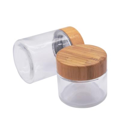 China Wholesale Cosmetic 5ml 15ml 30ml 50ml 100ml Clear Frosted Glass Jar With Bamboo Wooden Lid Custom LOGO for sale