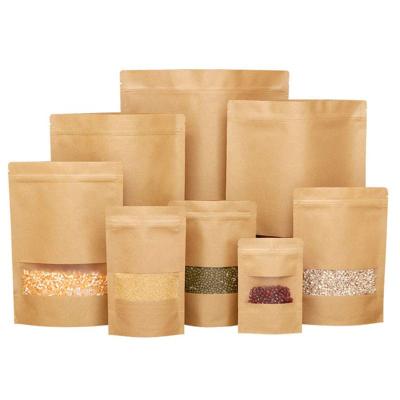 China BIODEGRADABLE Custom Printed Stand Up Kraft Paper Bag With Clear Window for sale