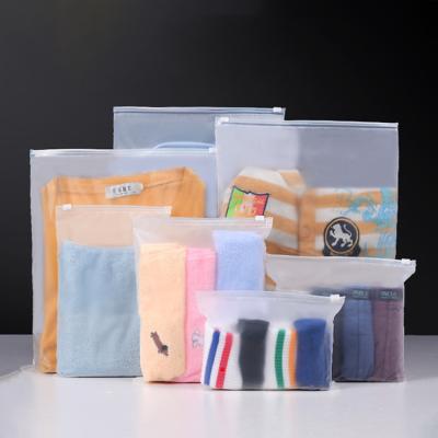 China Recyclable Matte Frosted Transparent Biodegradable Plastic Custom Packaging Zipper Bags T-Shirt Swimwear Zip Lock Clothing Bags With Logo for sale