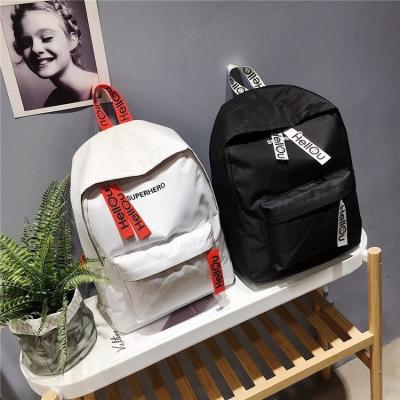 China Waterproof backpack travel bag small price and cheap wholesale college student school bag custom logo manufacturer for sale