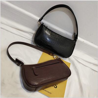 China Simple High Sense Of Women Vintage Design Small Alligator Armpit Handbags for sale