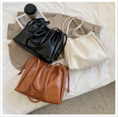 China 2021 Fashion New Style Quality Sense Fashion Ladies Springs Bags Simple Drawstring Handbags for sale