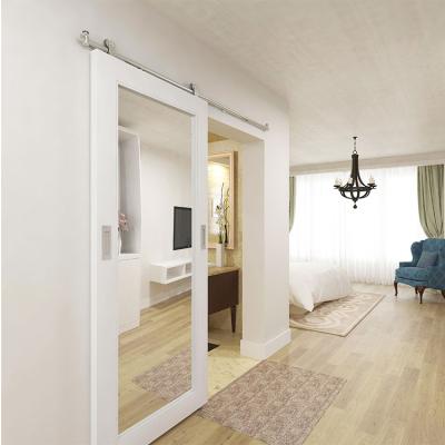 China Simple Sliding Frame European Style Windproof Solid White Wooden Barn Doors With Rollers for sale