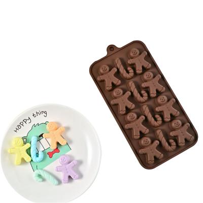 China Stocked Customized Handmade Brown 12 Holes DIY Food Grade Silicone Gingerbread Man Mold for sale