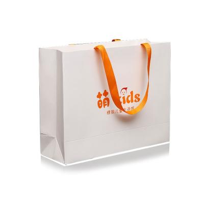 China Recycled materials factory supply attractive price paper gift packaging bag gift bag with ribbons for sale