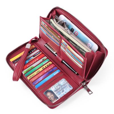 China Factory Direct Waterproof Ladies Travel Purse Zipper Around Clutch Wallets RFID Wristband Blocking PU Leather Women Wallet Along for sale