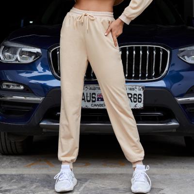 China Z0221 Breathable Harlan Pants Casual Elastic Straps Solid Color String Pants Sweatpants Women for sale