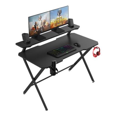 China Ergonomic Expandable Computer Gaming Table With Monitor Stand E-sports Gamer Desk With Shelf Black PC Gaming Desk for sale