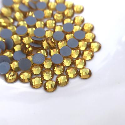 China Flatback factory wholesale dmc rhinestone hotfix crystal stone glass gold for clothes for sale