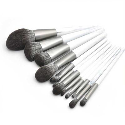 China Angular Blush Makeup Brushes Manufacturer Logo Makeup Sets Wholesale Soft White Makeup Brush Display Full Hair Skull 12pcs Beauty Tools for sale