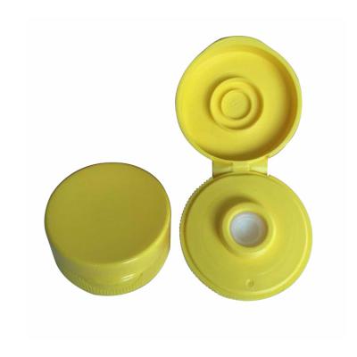 China Non Flip 38mm Plastic Flip Top Cap With Silicone Valve for sale