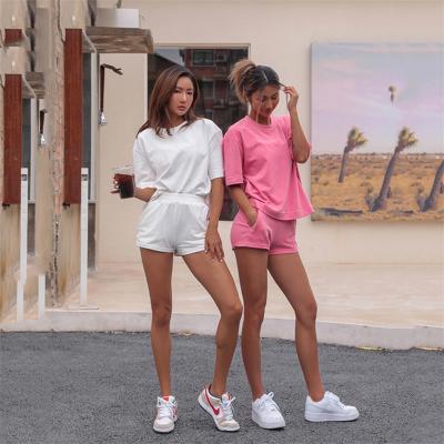 China Custom Logo Yoga Gym QUICK DRY 2 Piece Cotton Short Sleeve T-shirts Women Sweat Shorts Set for sale