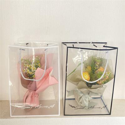 China Recyclable PVC Roses Bouquet Bag Florist Packaging Material New Waterproof Design Tote Bag Carry Bag Plastic Gift Wrap for sale