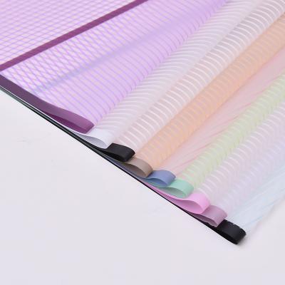 China Color Waterproof Custom Stripes Fashion Bouquet Translucent Plastic Korean Flower Wrapping Waterproof Flower Wrapping Paper for sale