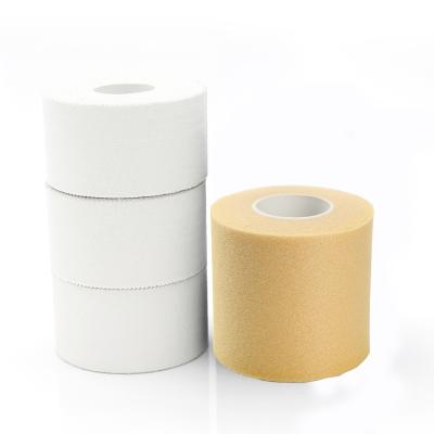 China Strong Viscosity Wholesale Breathable Tape Flat Side Embellished Side Sports Tape Zinc Oxide White Tape for sale