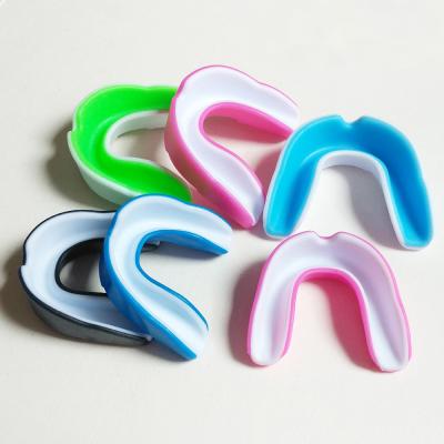 China Colorful Sports Double Boxing Strong And Sturdy Mouthguard With Transparent Box for sale