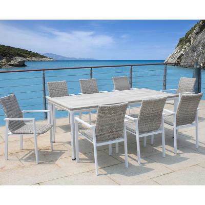 China Outdoor UV-Protection Ceramic Wicker Table Tables And Rattan Wicker Chairs Garden Patio Furniture Dining Set for sale