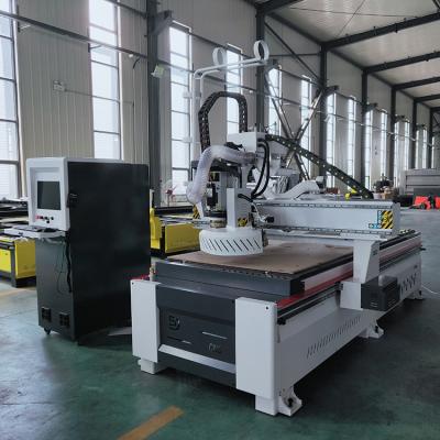 China Long service life new cnc router type atc 12 piece tools 9kw with vacuum table for sale