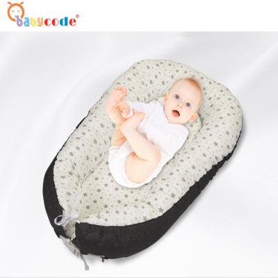 China Portable 100% Cotton Sleeping Baby Nest Portable Travel Lounger for sale