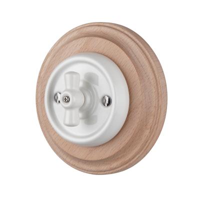 China Retro Style White Color Ceramic Recessed Wall Mount Rotary Switch With Log Color Wood Frame for sale