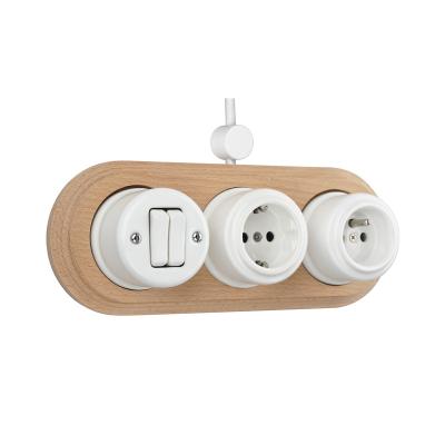 China Keruida Newcomers Easy Installation Wall 2 Gang Button Switch Combination With French-German Socket In Wooden Frame for sale