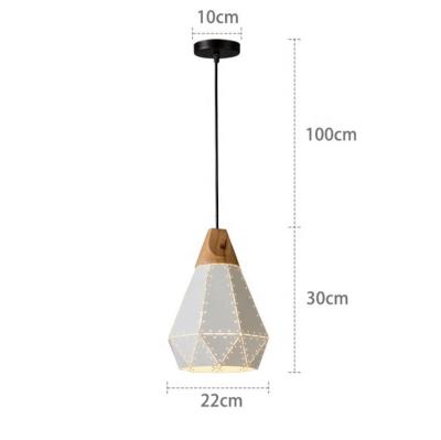 China European modern cutout iron macaroon dining chandelier cafe dining table small color droplight for sale