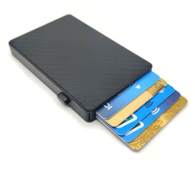 China Luxury And Lightweight Carbon Metal RFID Pop Up Credit Card Holder Case for sale