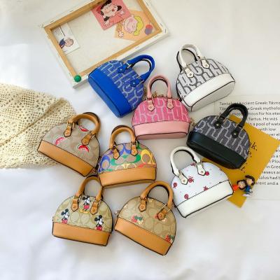 China Mini Kids Bags Designer Hot Selling Coin CUTE Clips Cross - Body Wallet Bag Little Girl Luxury Children Handbags for sale