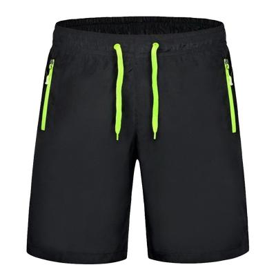 China Plus Size New Summer Men's Shorts Breathable Quick Dry Loose Beach Shorts Male Casual Short Pants Plus Size for sale