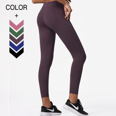 China Breathable High Quality Seamless Women High Waist Yoga Pants Workout Naked Feeling Tight Gaiters With Pocket for sale