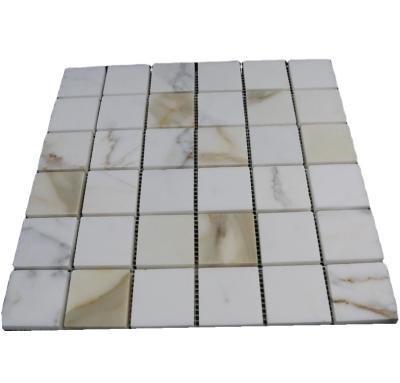 China Modern Calaccat Gold White Marble Square Shaped Mosaic Tiles For Black Splatter Walls for sale