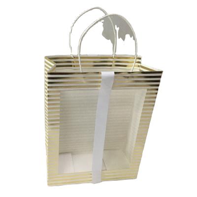 China Luxury Recycled Materials Custom Cardboard White Paper Bags With Handles Customized Exquisite Square Gift Packaging Paper Bags With Window for sale