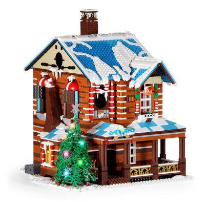 China Building Toy Christmas Tree Cottage Chimney Smoke House With Led Music Parts Model DIY Toys Building Blocks Set Gift for sale