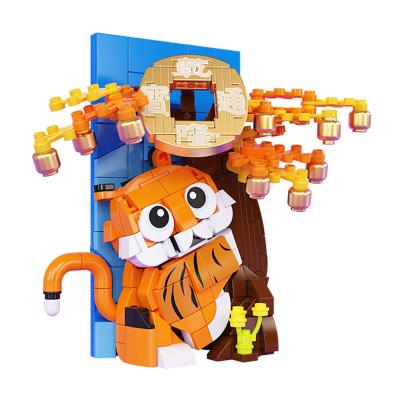 China Eco-friendly Material Creative Cartoon Tiger Theme Auspicious Ornament Cute Fun DIY Assemble Building Blocks Set Gift For Kids for sale