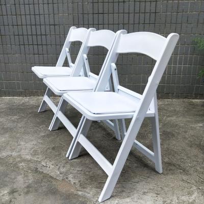 China Modern Wimbledon America Resin Folding Padded White Chair For Event Wedding Hotel Ballroom Chairs for sale