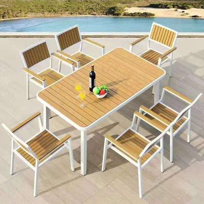 China 2021 Hot Sale Modern Dining Chair Set Wpc Outdoor Wooden Garden Furniture Outdoor Dining Table for sale