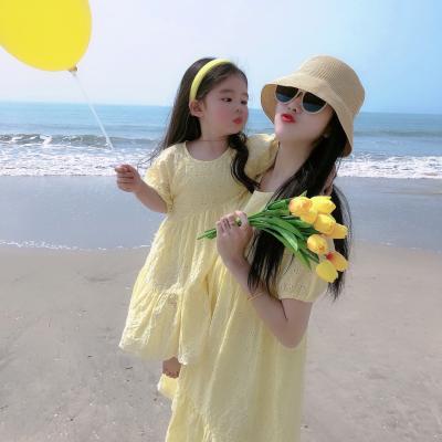 China Breathable Mommy and Me Dresses 2021 New Summer Girls Embroidered Hollow Princess Dress Beach Holiday Girls Dress for sale