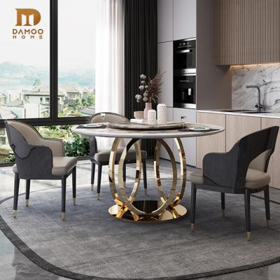 China Modern luxury modern marble dining table set round stainless steel wedding table set furniture for sale