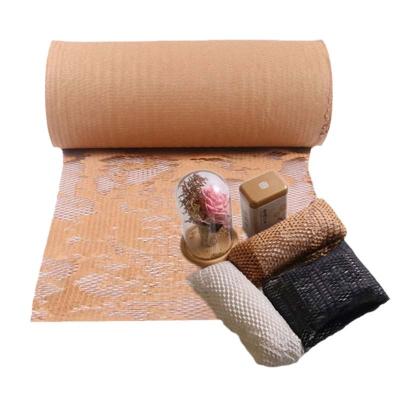 China Biodegradable Honeycomb Kraft Paper Roll Brown Protective Paper Kraft Paper for sale