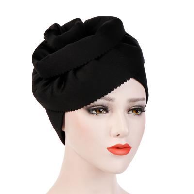 China Europe Striped Hand Cutting Oversized Flowers Plus Size Pure Color Turban Space Flip Cotton Hats For Women for sale