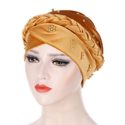 China Women fashion design velvet hijab simple color muslim turban hat for women twist braid beaded turban RAR-376 for sale