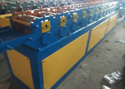 China Saw Cutting Shutter Door Roll Forming Machine 1 Inch Chain Stable Transmission for sale