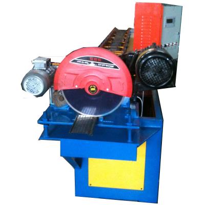 China 12 Zinc Aluminum Roller Shutter Door Cold Rolling Mill Holes Punching Equipment And 1'' Chain for sale