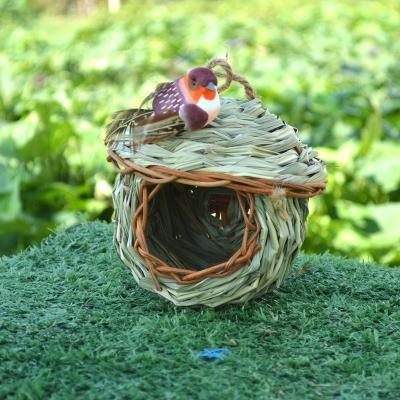 China New Straw Woven Breathable Bird Nest Breathable Bird Nest Outdoor Bird Cage House for sale