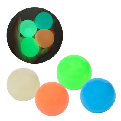 China Customized popular magic tpr glowing in dark gum squeeze ball stress relieve to glow sticky balls squishy balls relax toys for sale