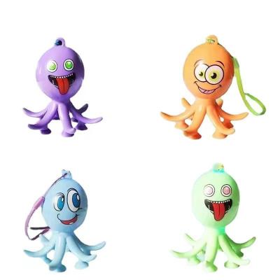 China 2022 New Product Popular Glow Octopus Squid Toys Telescopic Tube Popping Funny Pull Unzip Sensory Wiggle Toys Pendant With Light - B for sale