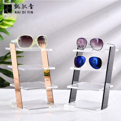 China Wholesale Durable 4 Layer Clear Acrylic Sunglasses Display Rack Glass Frame Display Showcase for sale